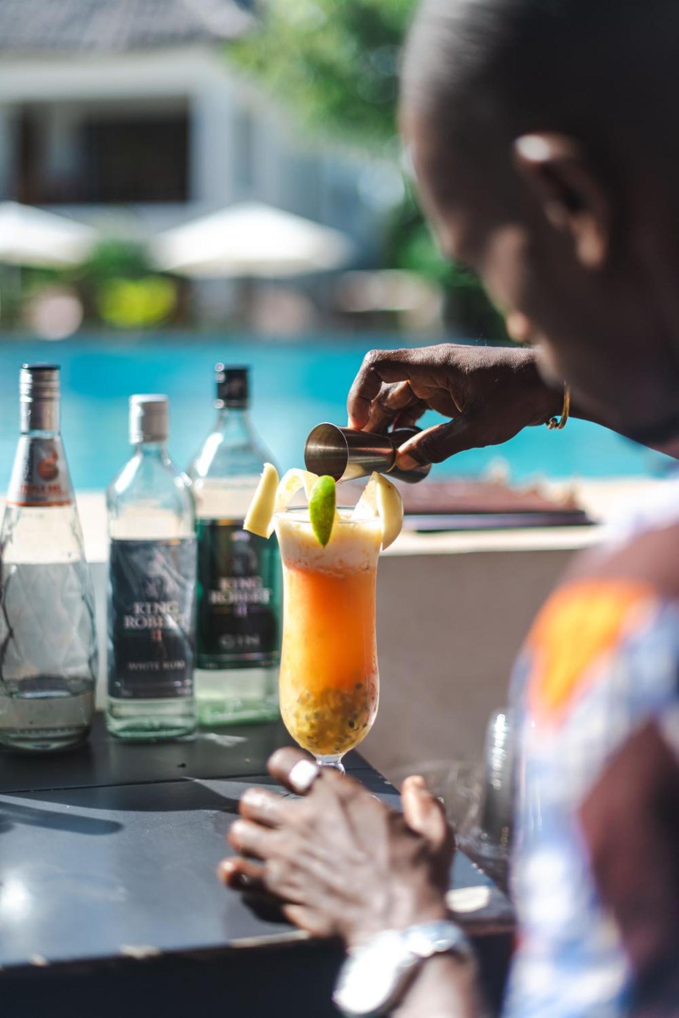 Zanzibella Hotel & Spa Kiwengwa  Extérieur photo A bartender preparing a cocktail